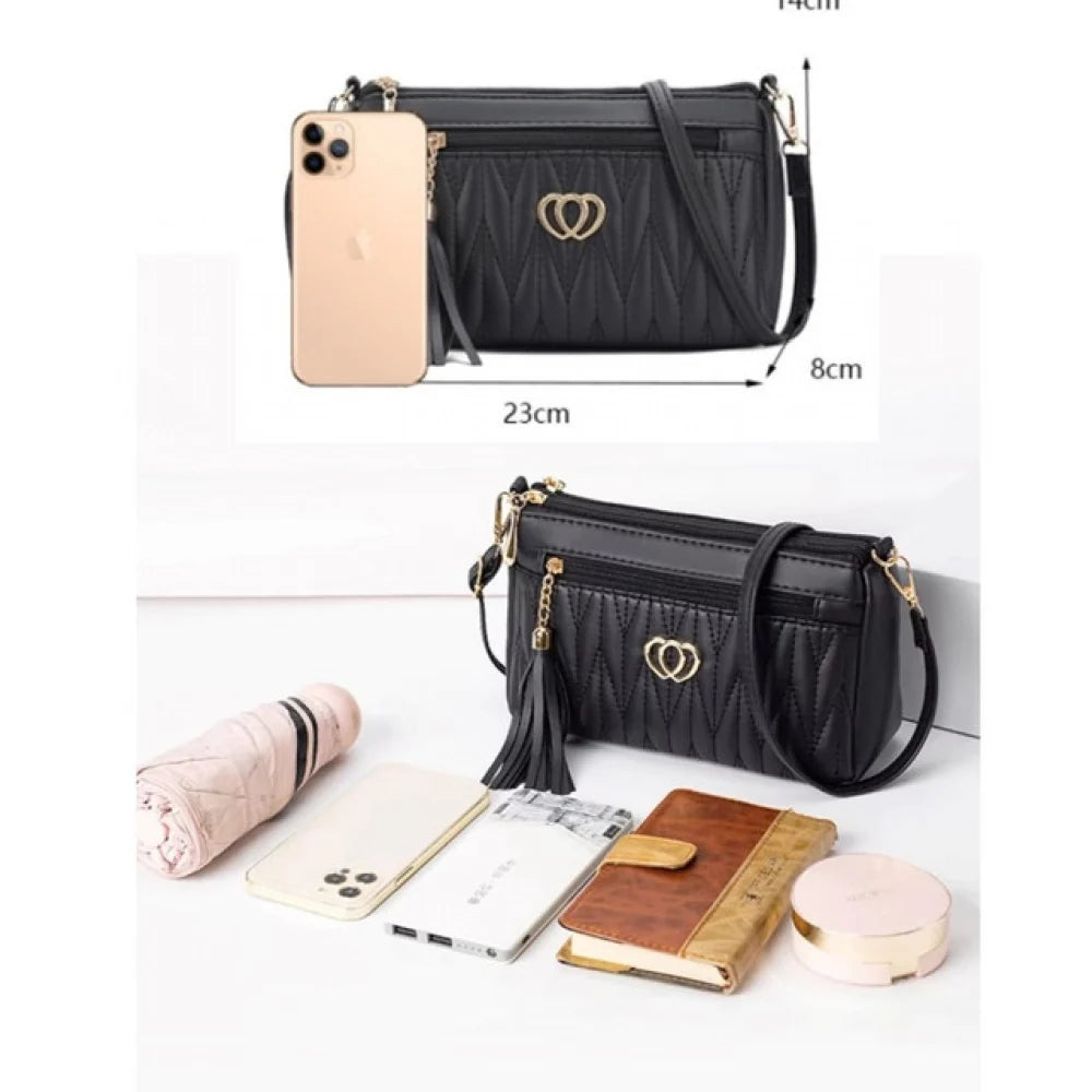 Women's Quilted Faux Leather Crossbody Sling Bag with Tassel Accent - Black