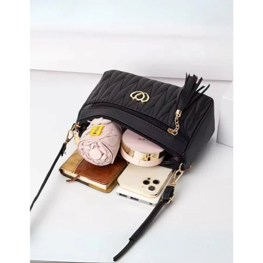 Women's Quilted Faux Leather Crossbody Sling Bag with Tassel Accent - Black